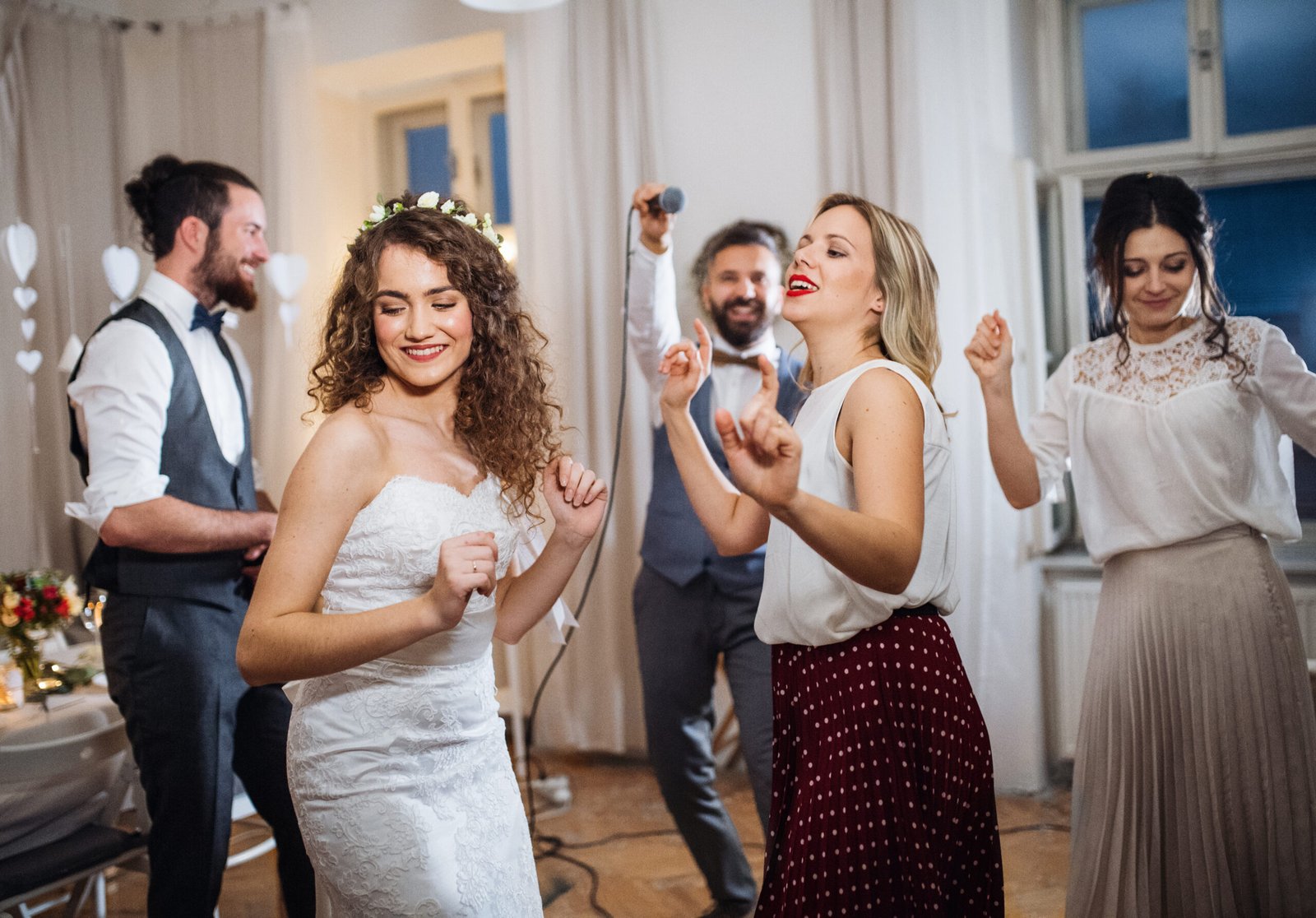 Bride and guests dancing at a Duluth wedding reception