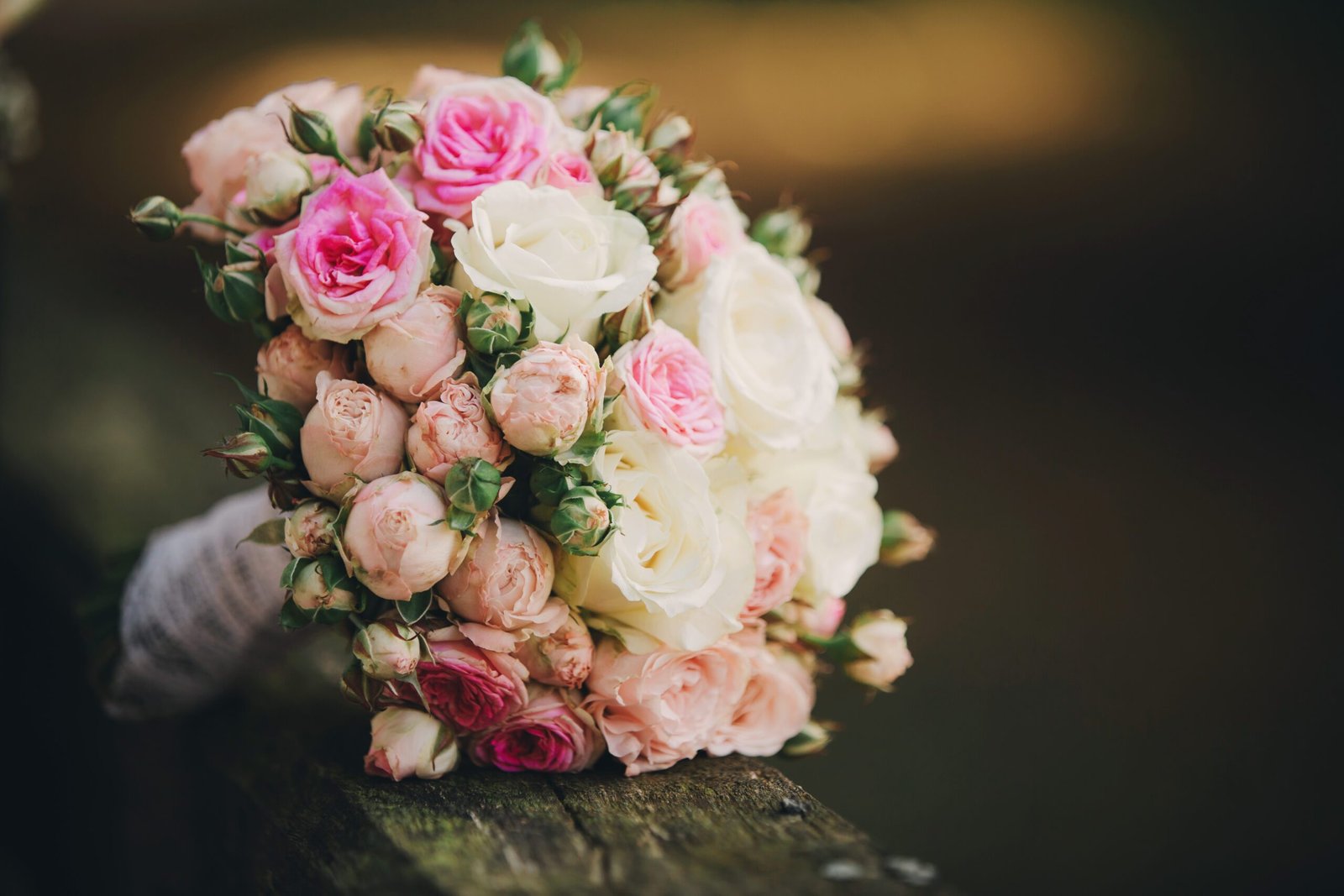 Professionally arranged wedding bouquet of pink roses