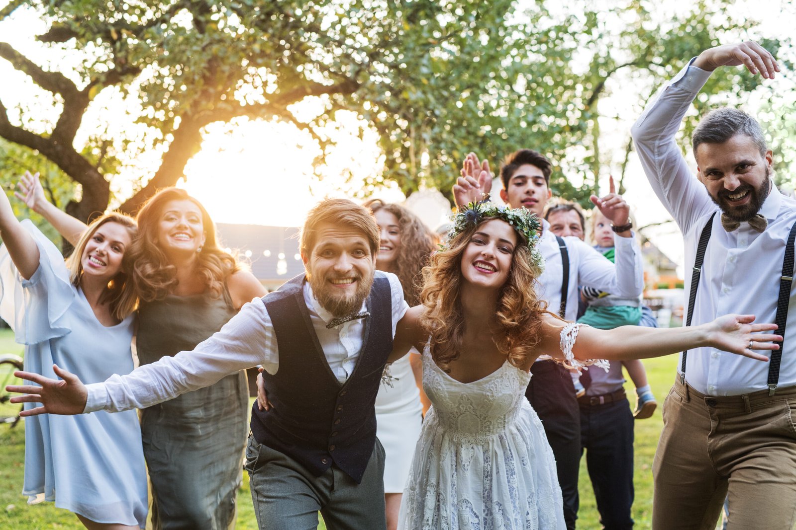Bride, groom and guests posing together at a Duluth wedding