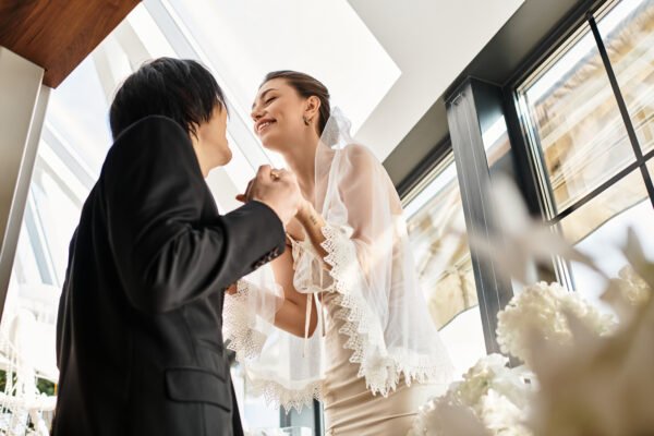 Happy couple embracing in a tender moment on their wedding day