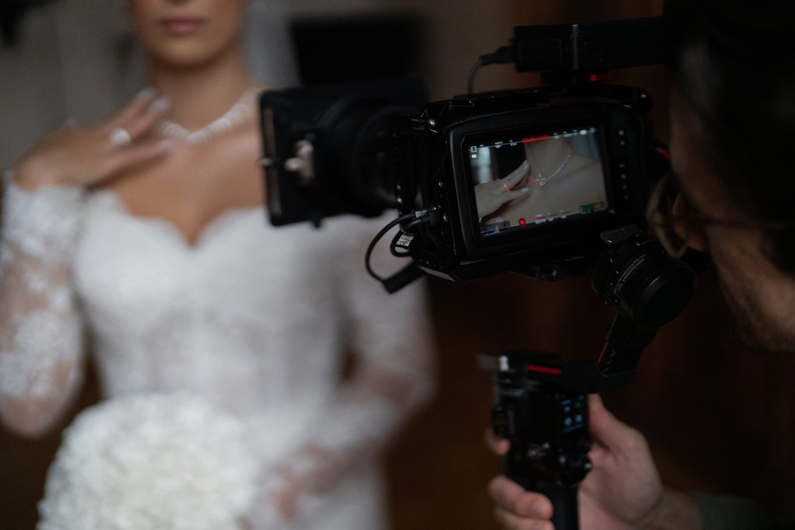 Photographer capturing a bridal pair on the wedding day