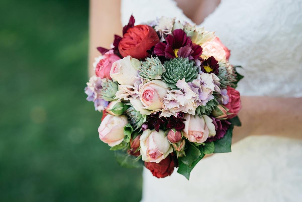Bridal bouquet of roses, hydrangea and greenery for a Duluth wedding